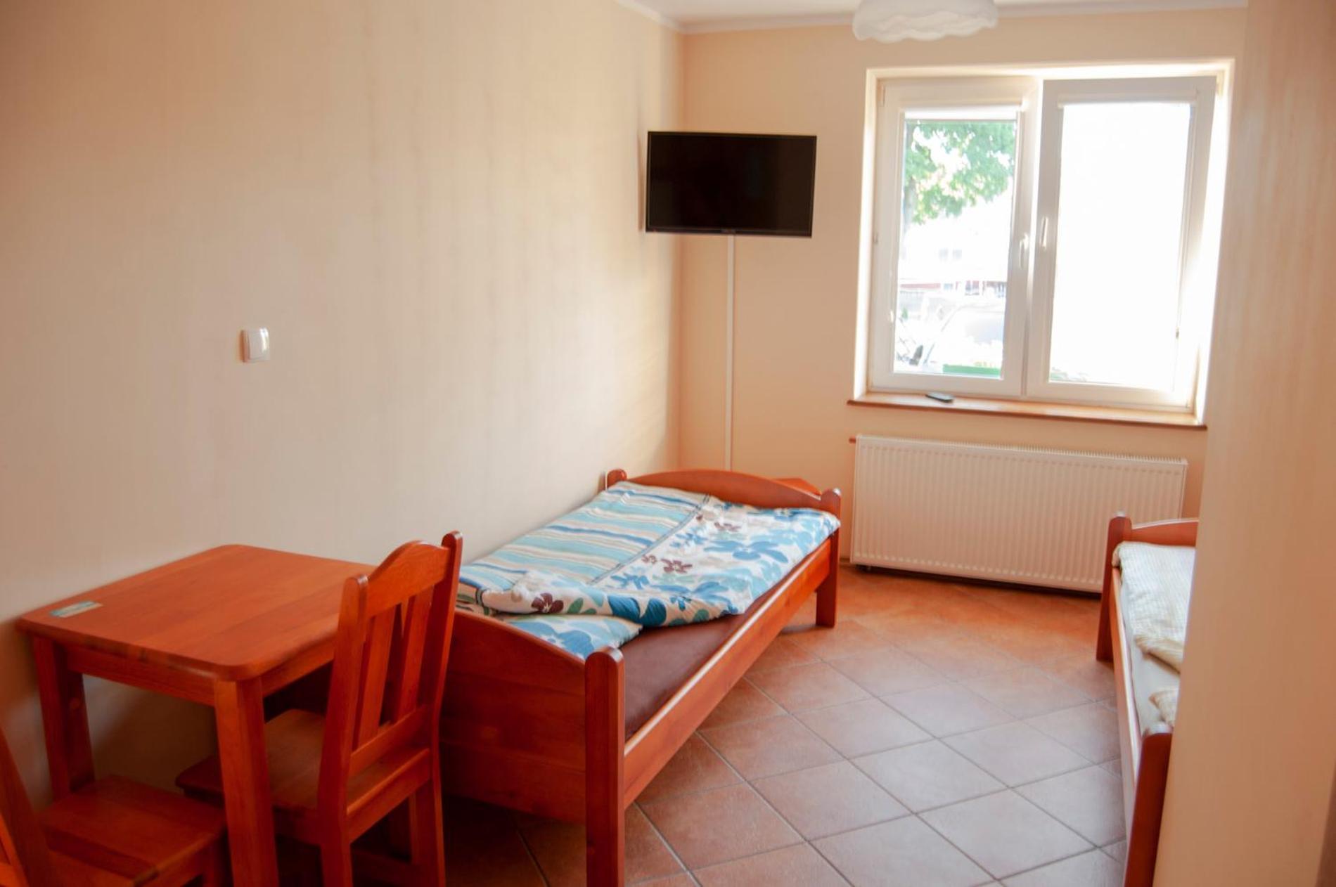 Jantar Pokoje I Domki U Reni Habitación foto